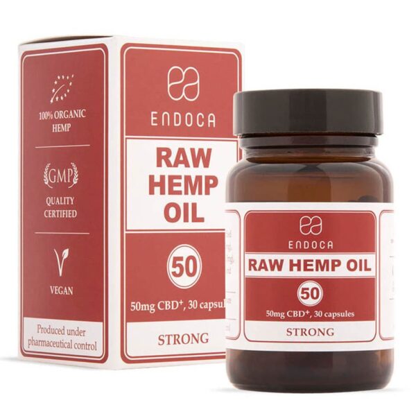 a bottle of raw hemp oil next to a box.